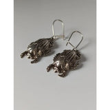 Silver steed scarab handcrafted silver scarab dropped earrings with detailed textured surfaces and hook clasps