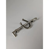 Silver steed shoe and cane silver brooch shaped like a horseshoe and key stock tie pin in silver metal