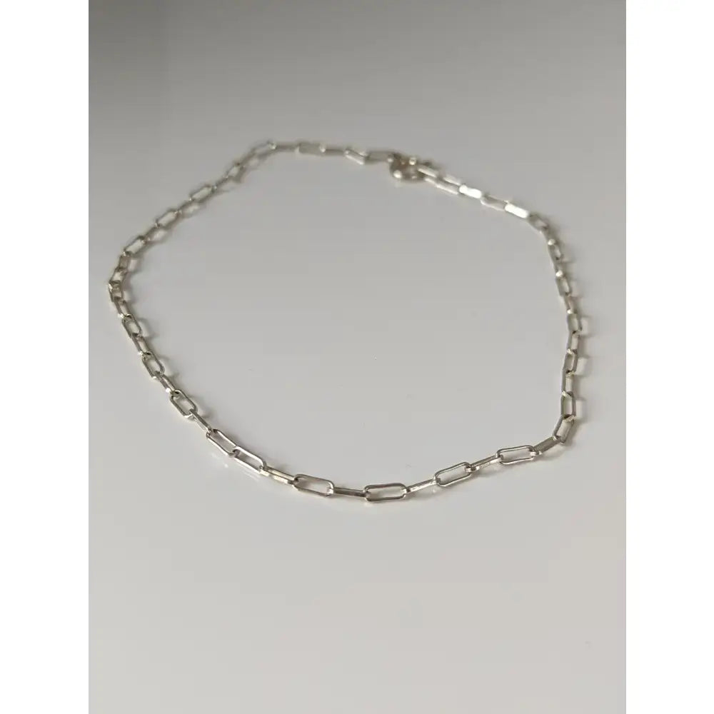 Silver steed slim link silver bracelet with a sleek silver-toned paperclip-style chain design
