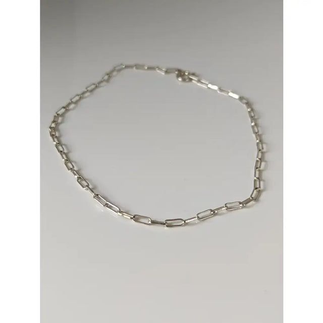 Silver steed slim link silver bracelet with a sleek silver-toned paperclip-style chain design