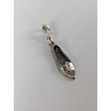 Silver steed slipper silver charm is a silver charm with intricate shoe details and a polished metallic finish with clasp