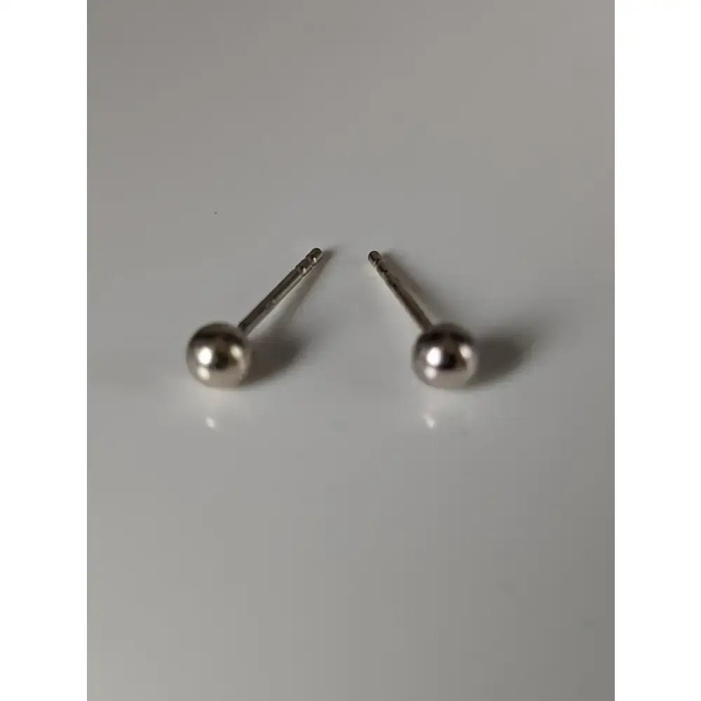 Silver steed small ball stud earrings with minimalist polished silver ball heads and slender posts