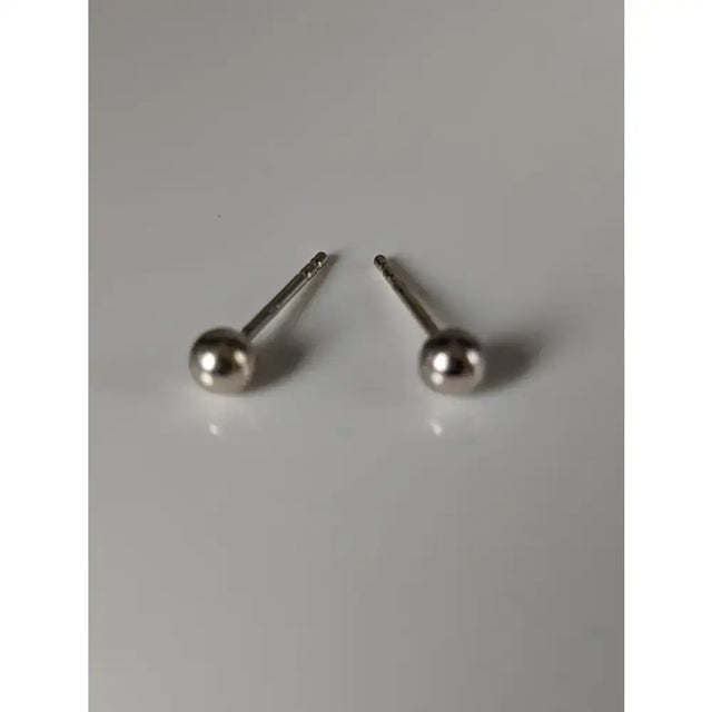 Silver steed small ball stud earrings with minimalist polished silver ball heads and slender posts