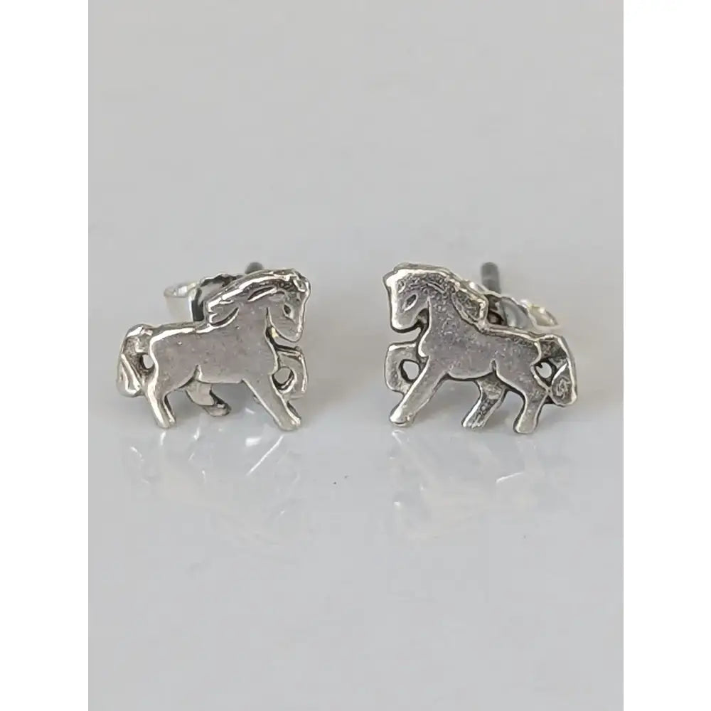 Silver steed small silver horse studs featuring polished metallic finish and horse-shaped design in silver