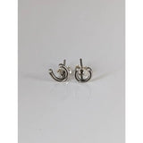 Silver steed small sterling silver horseshoe stud earrings with a minimalist textured design