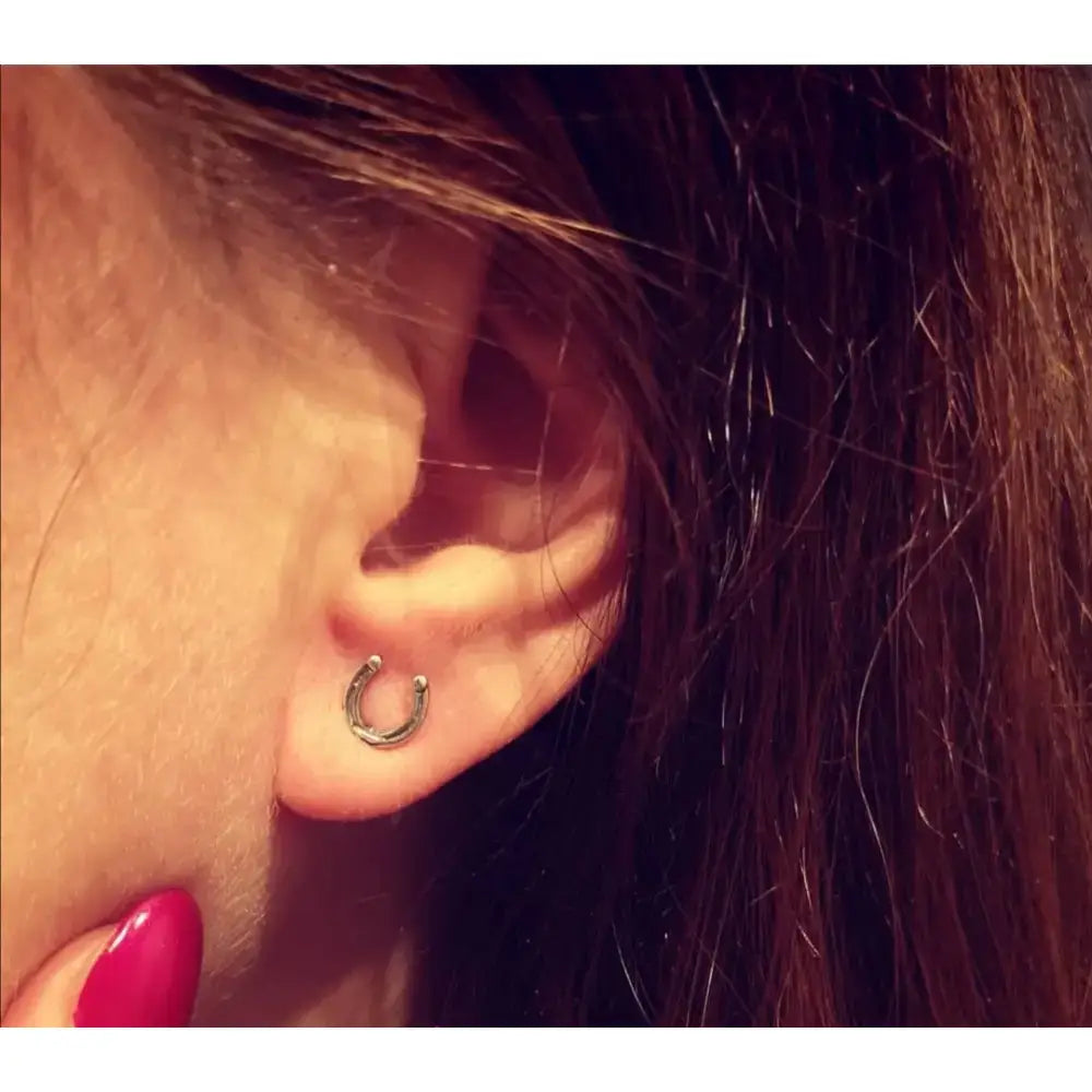 Silver steed small sterling silver sleek horseshoe stud earrings with a smooth minimalist design