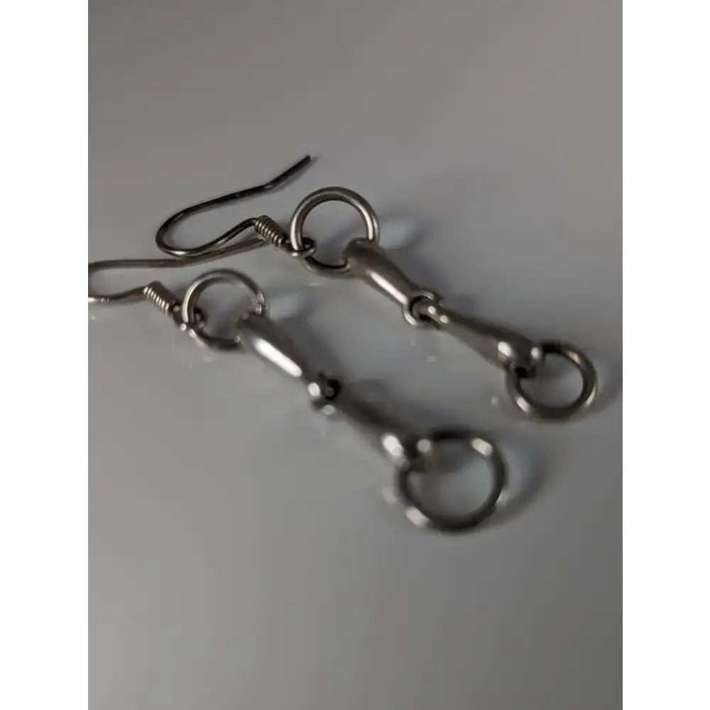 Silver steed snaffle sterling silver long dropped earrings with polished horsebit design and classic hooks