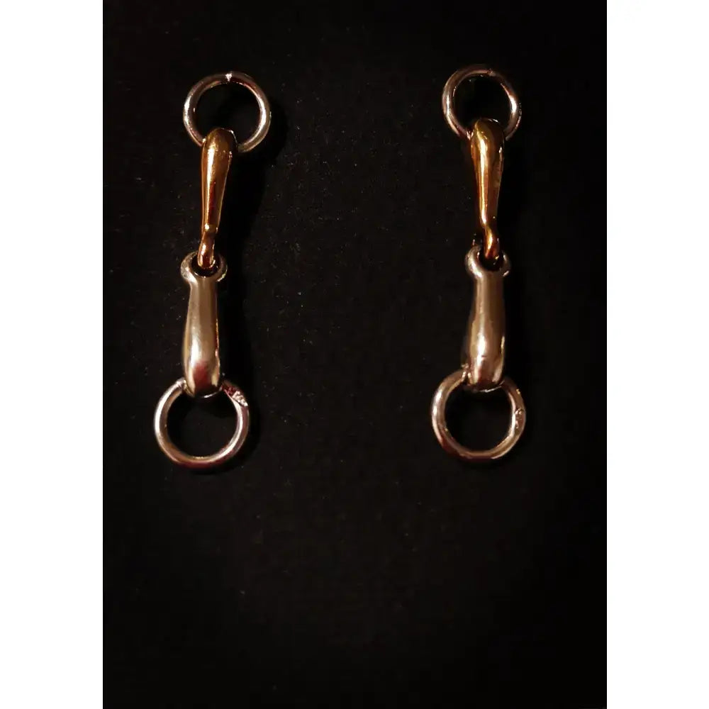 Silver steed snaffle gold-colored metal snaffle bit stud earrings with polished reflective surfaces and classic design