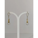 Silver steed snaffle bit stud earrings in silver and gold tones with a sleek polished finish in sterling silver bit earrings style