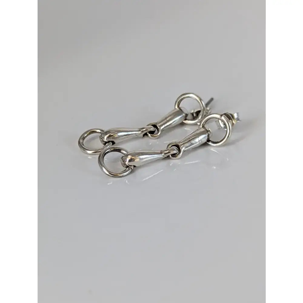 Silver steed snaffle bit stud earrings with polished sterling silver bit design and classic equestrian style