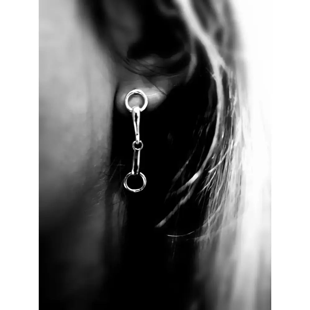 Silver steed snaffle bit stud earrings in sterling silver with a sleek minimalist horsebit design