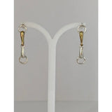Silver steed snaffle two-tone snaffle bit stud earrings in polished silver and gold with a minimalist design
