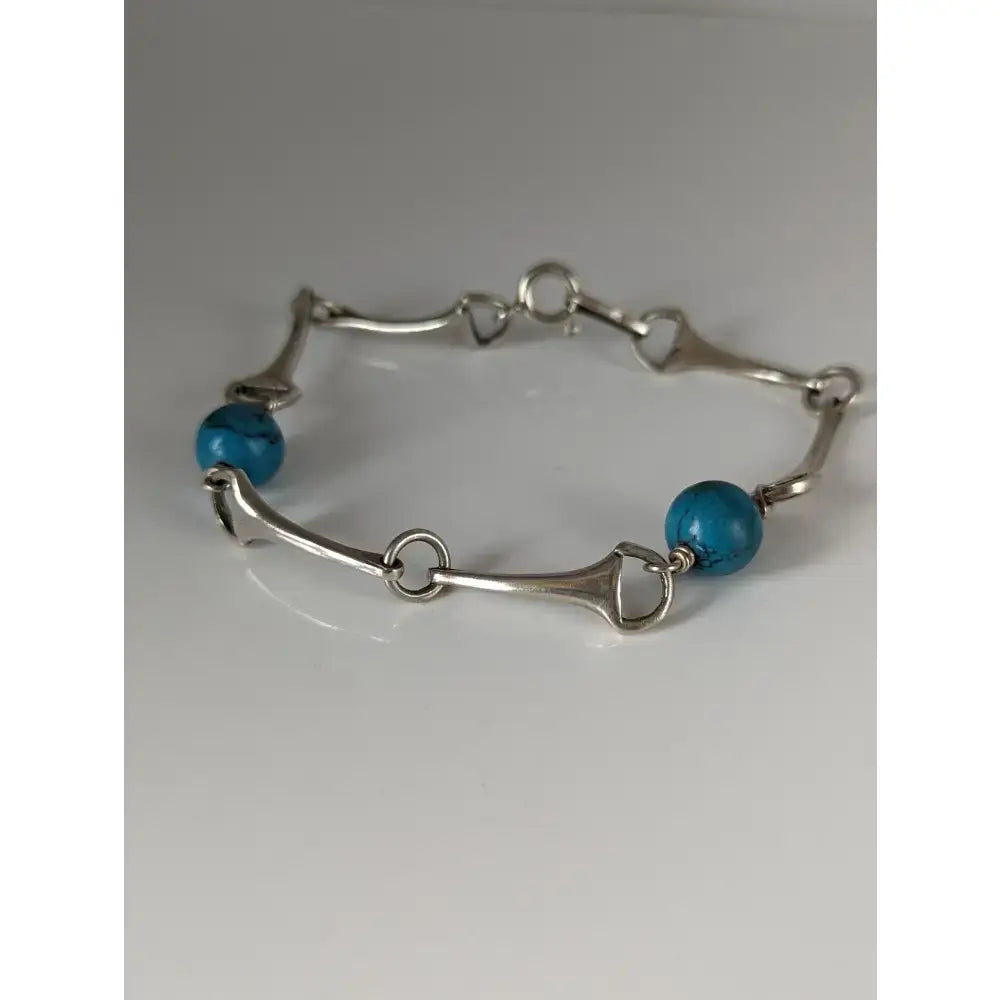 Silver steed snaffle solid silver bracelet with turquoise beads for a stylish and unique accessory look