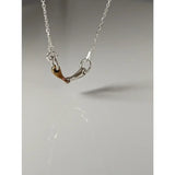 Silver steed snaffle necklace silver horsebit necklace with copper-colored accent for a stylish look