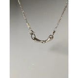 Silver steed snaffle necklace with a sleek silver horsebit pendant and delicate polished chain