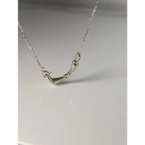Silver steed snaffle necklace featuring a minimalist silver horsebit pendant on a sleek fine chain