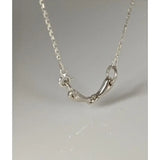 Silver steed snaffle necklace with a delicate silver chain and elegant horsebit design