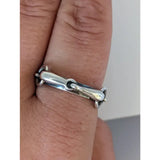 Silver steed snaffle silver horsebit ring with sleek polished finish and interlocking links on a silver band