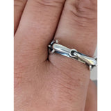 Silver steed snaffle silver horsebit ring with polished finish and intricate link design on a silver band
