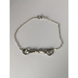 Silver steed snaffle chain delicate bracelet with silver horsebit and polished metallic linked chain design