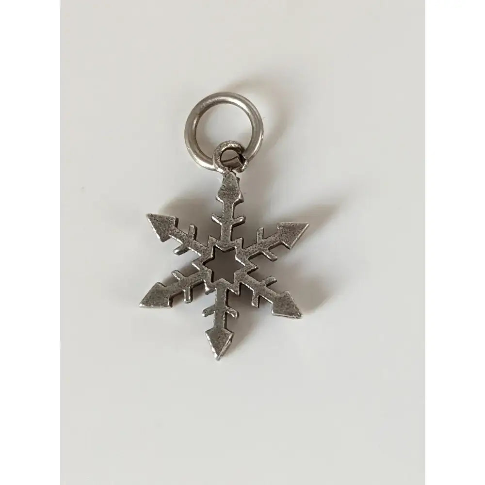 Silver steed snowflake silver pendant featuring a sterling silver snowflake silver pendant with pointed arms and ring