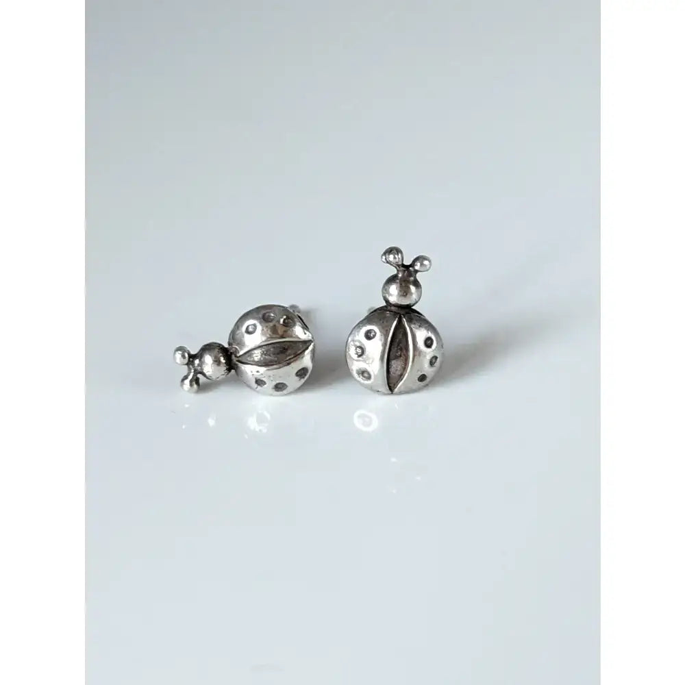 Silver steed spotted ladybird stud earrings featuring detailed dot patterns and tiny antennae in silver ladybird stud earrings style