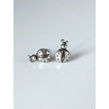Silver steed spotted ladybird stud earrings featuring detailed dot patterns and tiny antennae in silver ladybird stud earrings style