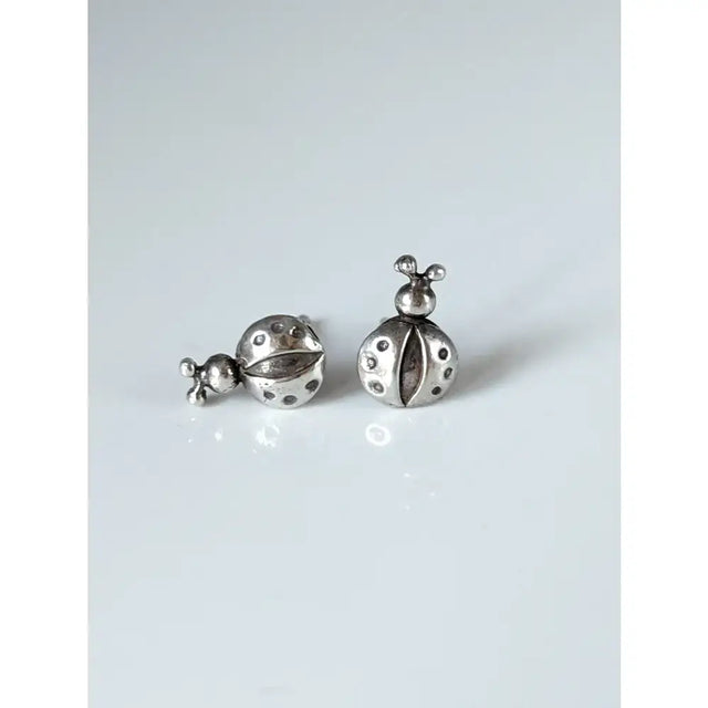 Silver steed spotted ladybird stud earrings featuring detailed dot patterns and tiny antennae in silver ladybird stud earrings style