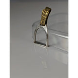 Silver steed stirrup silver pendant with a silver horse stirrup and a gold-colored buckle detail