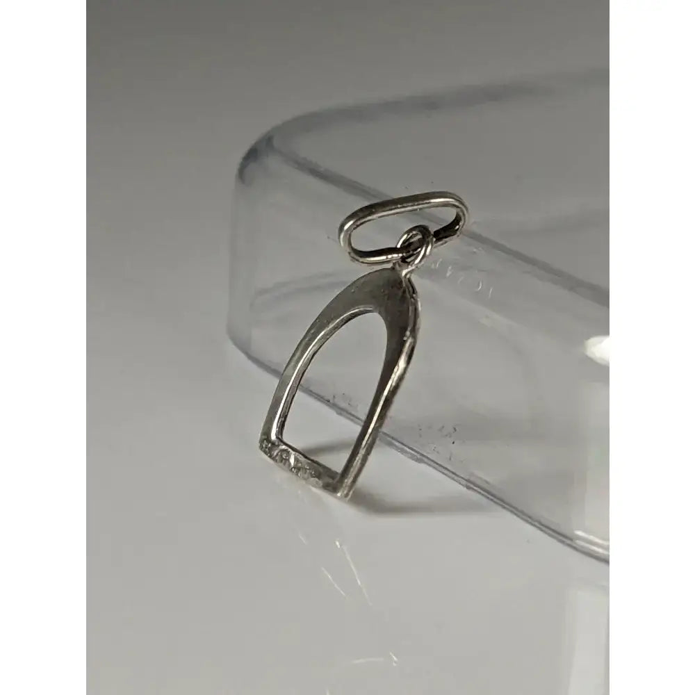 Silver steed stirrup silver pendant charm with polished metallic finish and stones in equestrian jewelry style