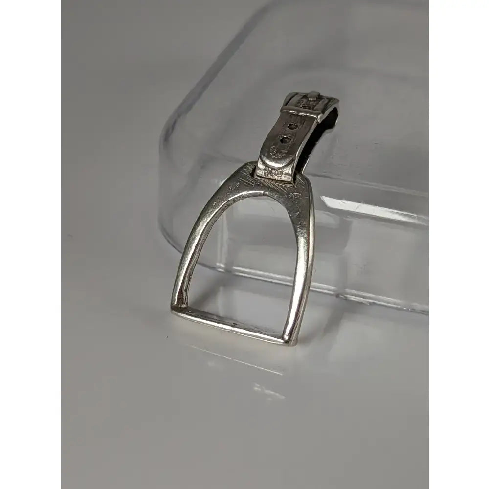 Silver steed stirrup pendant with silver horsebit-style metal stirrup and black leather strap for a unique silver pendant look