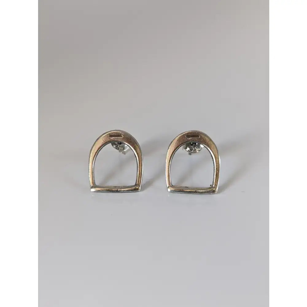 Silver steed stirrup sterling silver stud earrings with polished metallic horsebit design