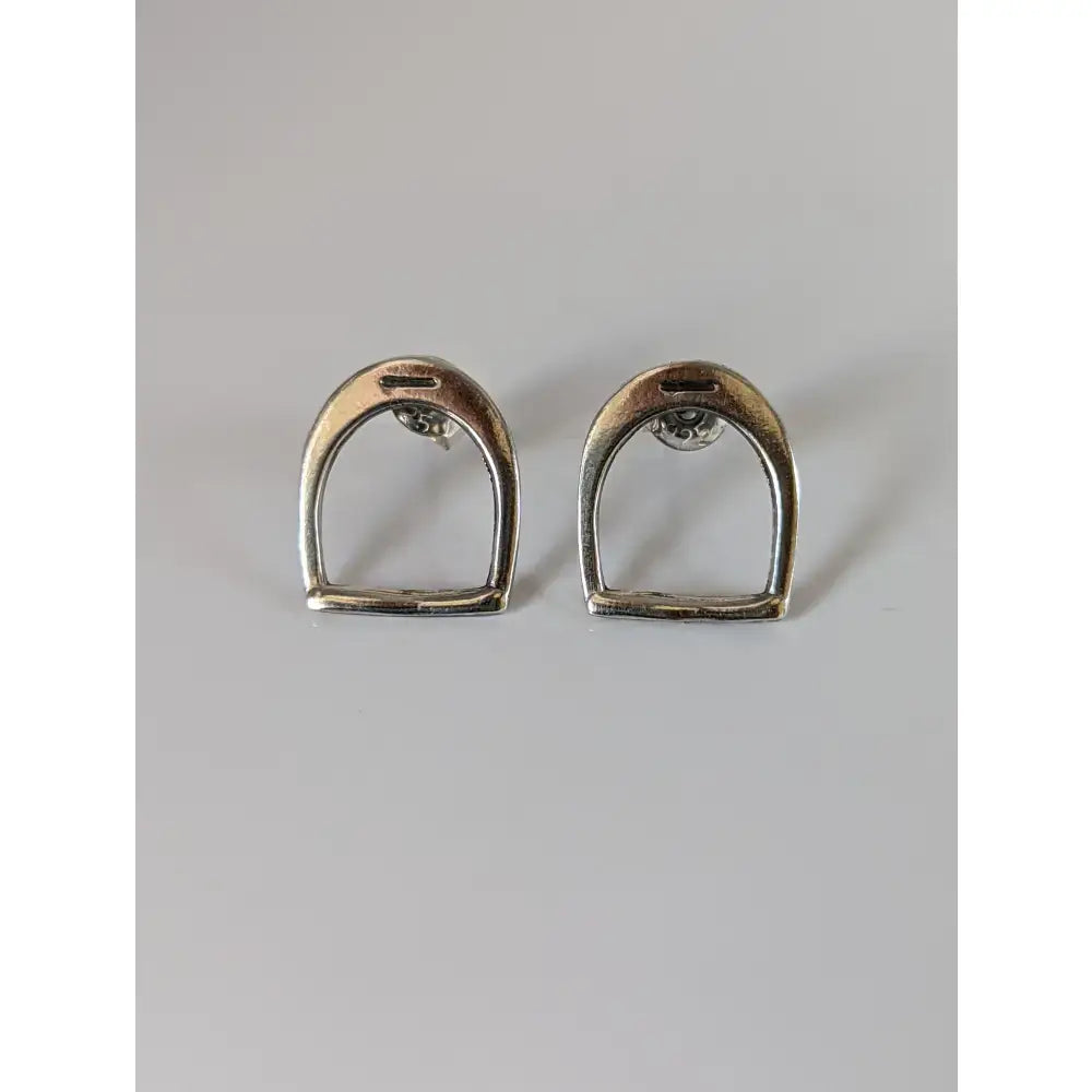 Silver steed stirrup sterling silver stud earrings with a minimalist horsebit design in silver tone