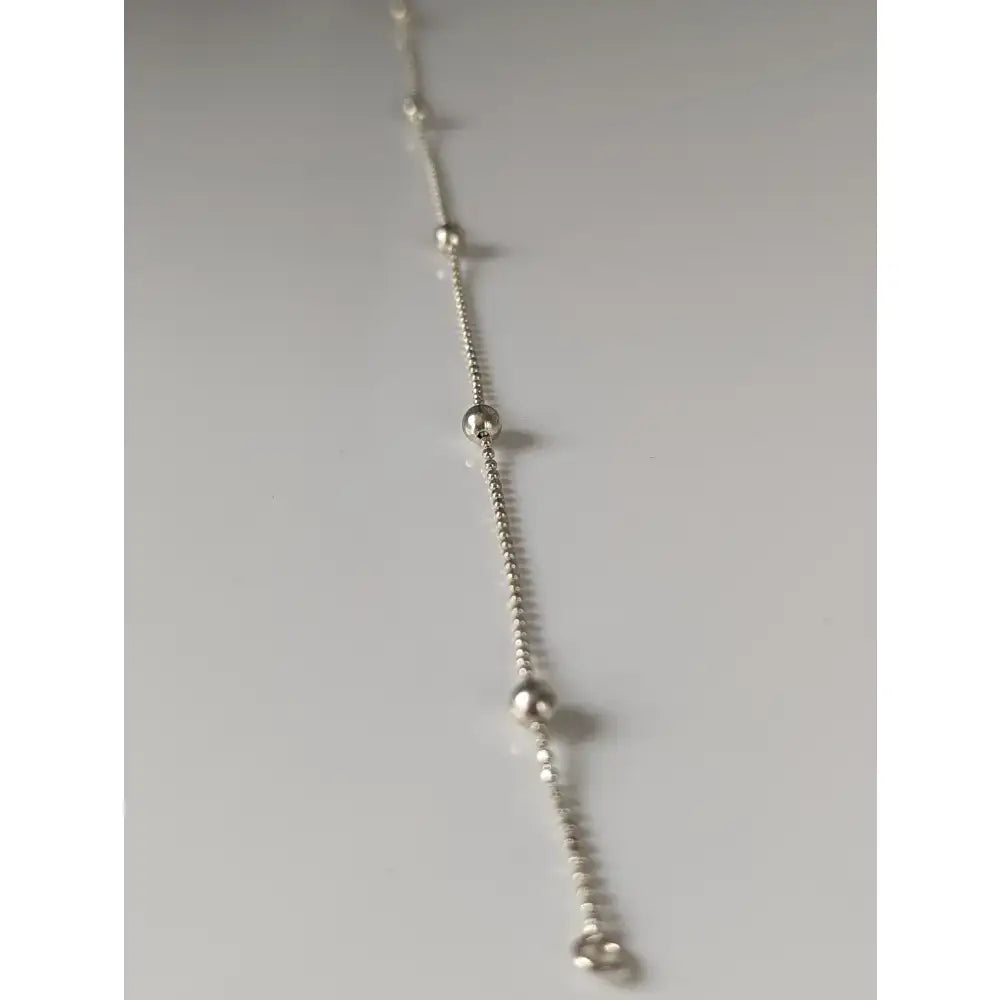 Silver steed studded chain silver bracelet with small spherical beads and a delicate studded ball chain design