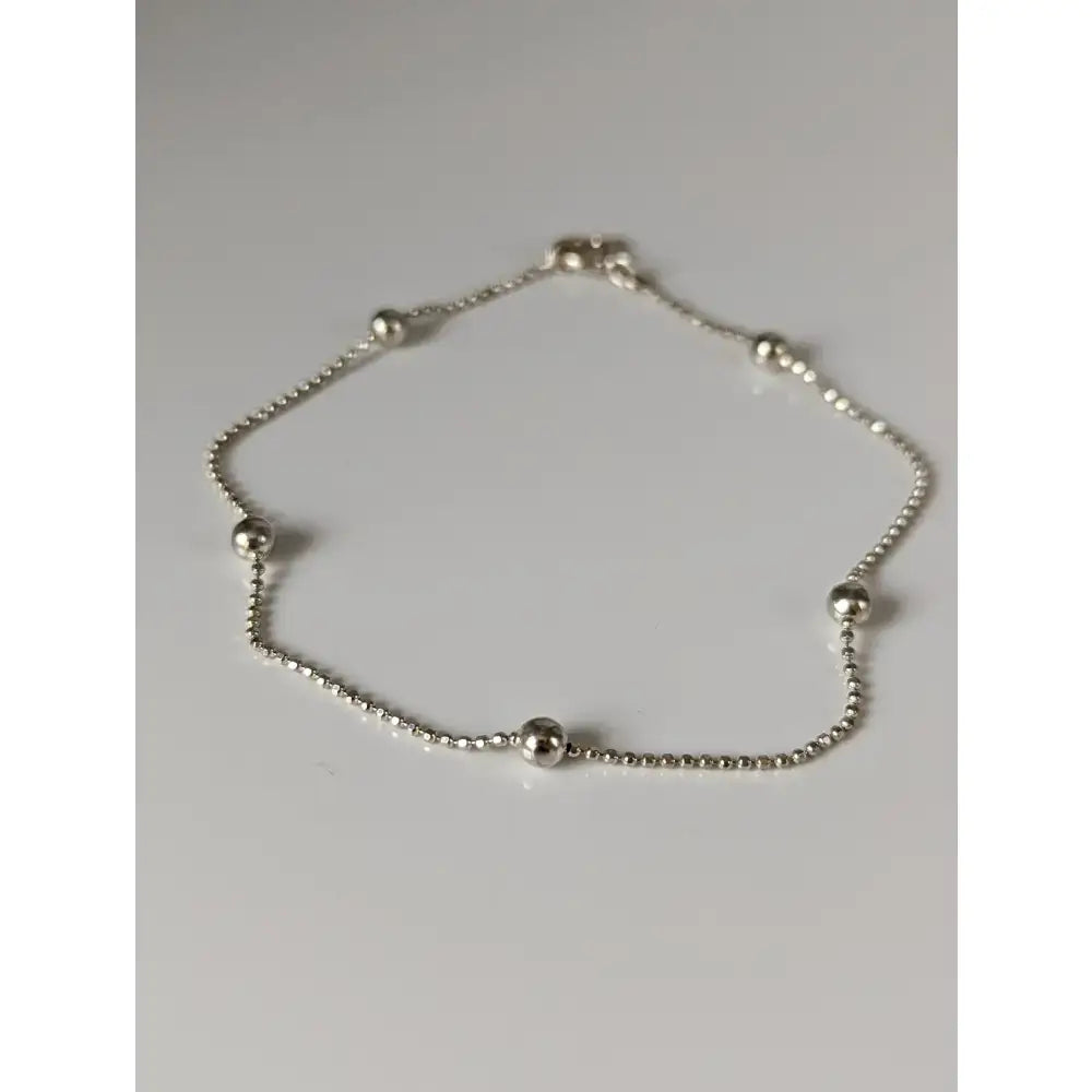 Silver steed studded silver bracelet with delicate chain and evenly spaced studded ball chain beads