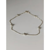 Silver steed studded silver bracelet with delicate chain and evenly spaced studded ball chain beads