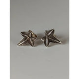 Silver steed sterling silver sweetgum leaf stud earrings with a textured handcrafted finish in star shape