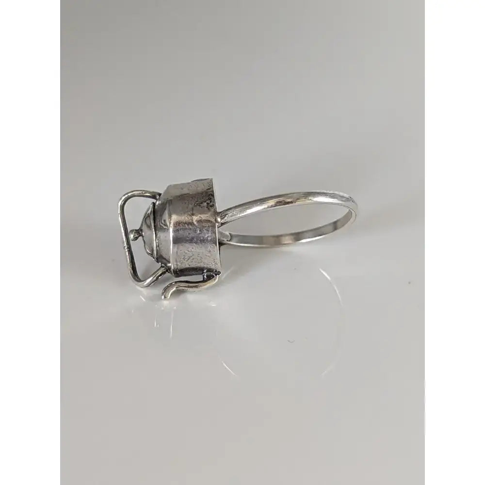 Silver steed teapot silver ring featuring a silver-toned metal band with a detailed miniature kettle charm design