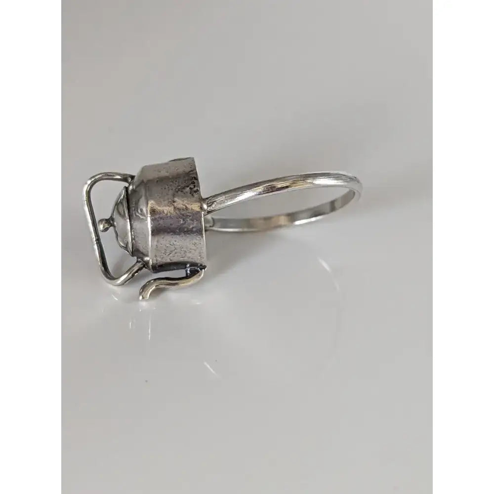 Silver steed teapot silver ring featuring a silver-toned metal miniature kettle design with detailed spout and handle