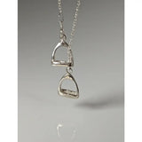 Silver steed thread necklace with double stirrups pendant in polished silver on a delicate chain stirrup silver necklace