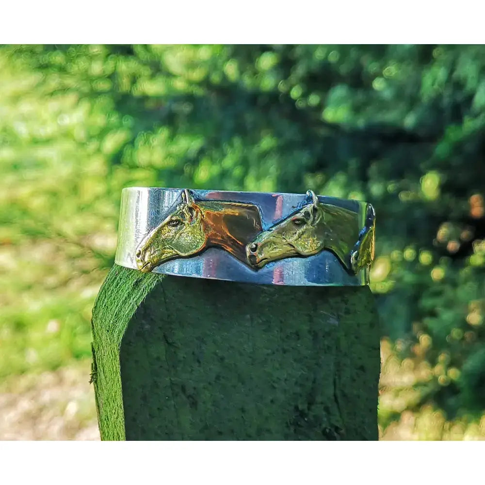 Silver steed three horses heads bangle with silver and gold-toned detailed sculpted horse head cuff design