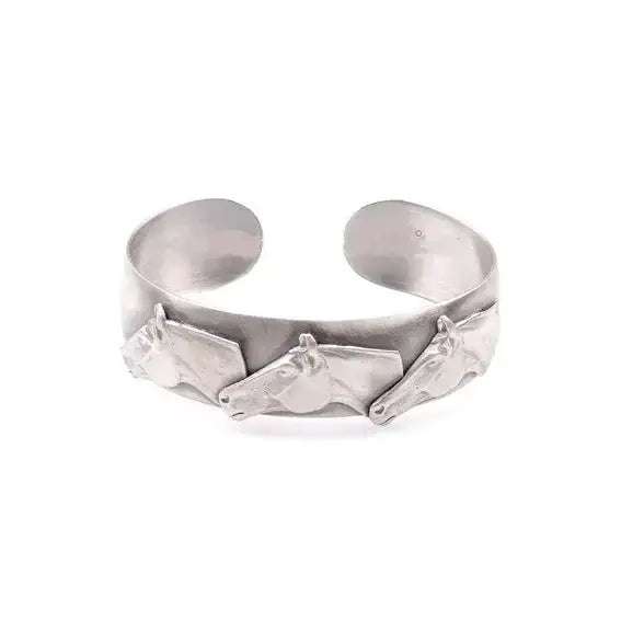 Silver steed three silver-toned metal cuff bracelet with three horses heads bangle embossed design