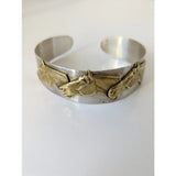 Silver steed three silver cuff bracelet with three horses heads bangle featuring raised golden horse head motifs