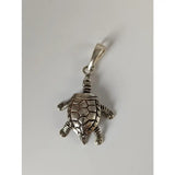 Silver steed tortoise silver pendant featuring a detailed shell and textured limbs in polished silver material