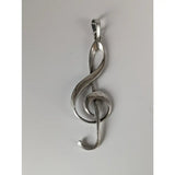 Silver steed treble clef silver pendant with a sleek polished metallic finish and elegant flowing design