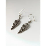 Silver steed tropical silver leaf dropped earrings with intricate veining details in a dangle style