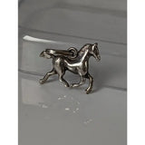 Silver steed trotting horse silver pendant with detailed sculpted features and loop for easy attachment