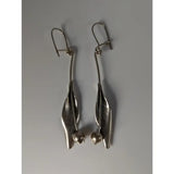 Silver steed tulip dangling earrings featuring silver leaf shapes with polished premium sterling silver and spherical accents