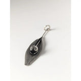 Silver steed tulip pendant with a silver leaf shape and a clear gemstone centerpiece