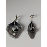 Silver steed tulip silver leaf-shaped earrings with textured handcrafted finish and small spherical accents